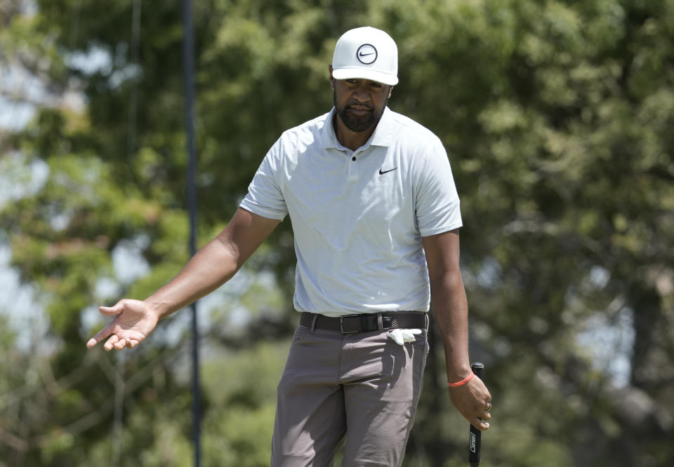 Tony Finau, of the United States, reacts to missing a birdie on the second green during the Mexico Open golf tournament's third round in Puerto Vallarta, Mexico, Saturday, April 29, 2023. (AP Photo/Moises Castillo)