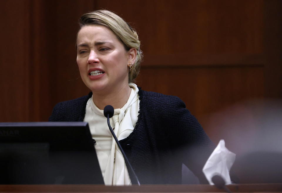 Amber Heard gets emotional on the stand testifying about Johnny Depp&#39;s alleged abuse and sexual assault.