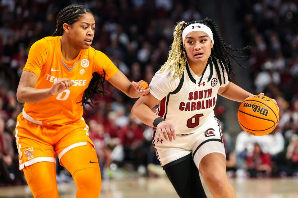 South Carolina Gamecocks guard Te-Hina Paopao (0) drives around Tennessee Lady Vols guard Jewel Spear (0) in the first half at Colonial Life Arena March 3, 2024, in Columbia, South Carolina.