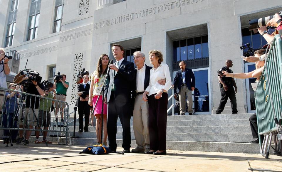 PHOTO: Former U.S. Sen. John Edwards addresses the media alongside his daughter Cate Edwards (L) and his parents Wallace and Bobbie Edwards at the federal court May 31, 2012 in Greensboro, North Carolina. (Sara D. Davis/Getty Images)