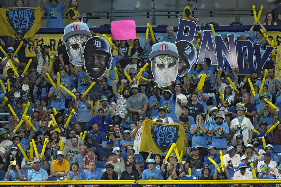 Fans in "Randy Land" cheer as Tampa Bay Rays' Randy Arozarena bats against the Los Angeles Dodgers during the fifth inning of a baseball game Friday, May 26, 2023, in St. Petersburg, Fla. (AP Photo/Chris O'Meara)