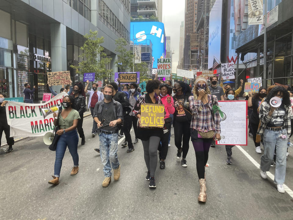 Photo by: STRF/STAR MAX/IPx 2020 10/24/20 A Black Lives Matter Protest is seen in New York City. The protest began in Times Square and then moved up to Columbus Cirlcle. At one point the BLM protesters confronted a small contingent of Trump supporters and tempers flared. Police calmly tried to break up the skirmishes, but BLM protesters cursed and hurled insults at them as they were trying to keep the peace.