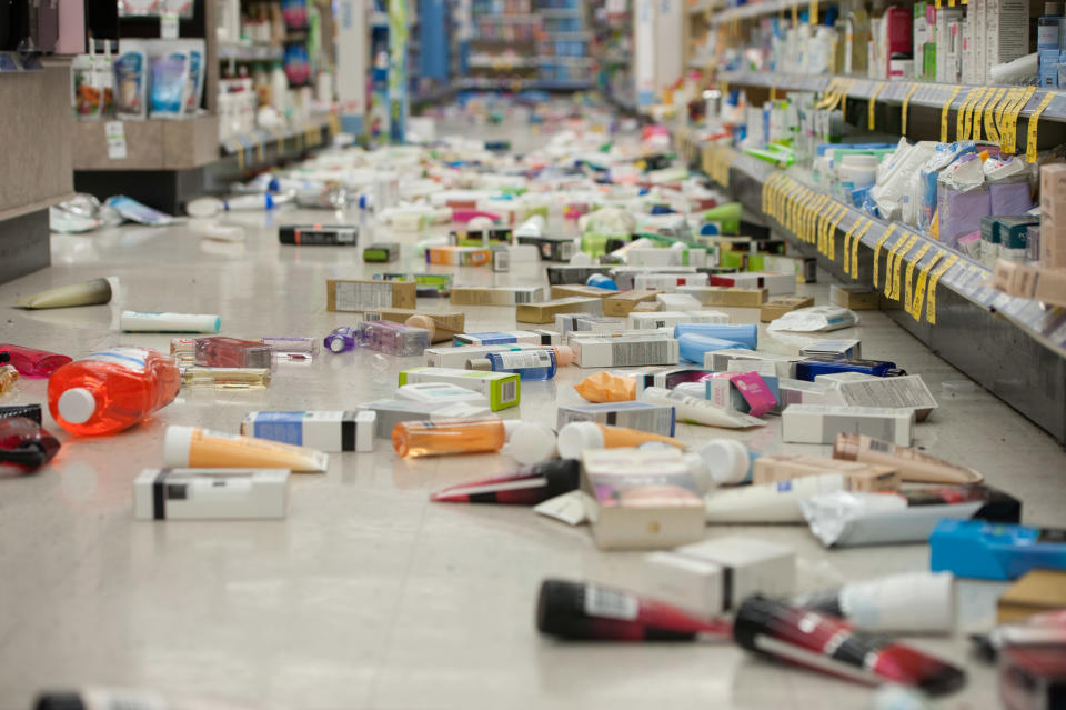 Merchandise is strewn across the floor in a La Habra Walgreens following a 5.1 earthquake centered near La Habra Friday night March 28, 2014. (AP Photo/The Orange County Register, Blaine, Ohigashi)