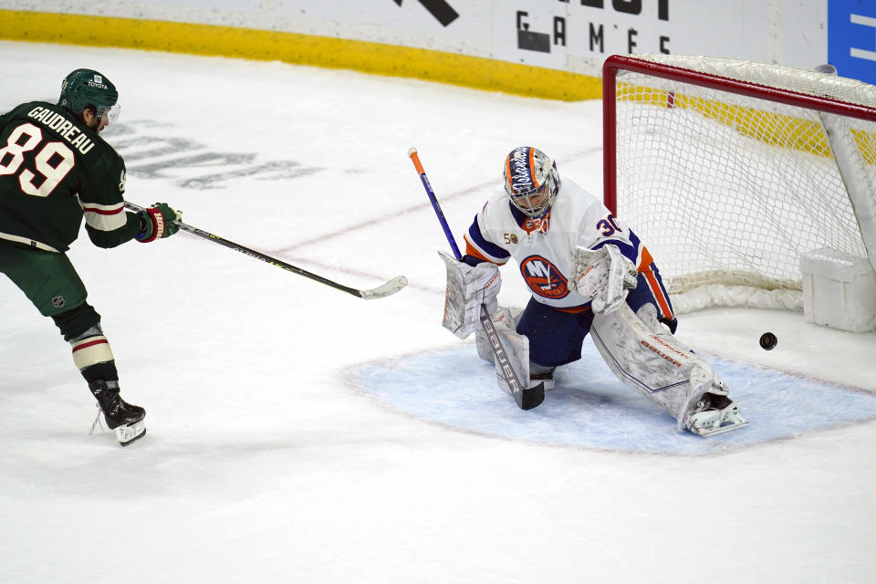 Minnesota Wild center Frederick Gaudreau (89) scores a goal past New York Islanders goaltender Ilya Sorokin during a shootout of an NHL hockey game Tuesday, Feb. 28, 2023, in St. Paul, Minn. (AP Photo/Abbie Parr)