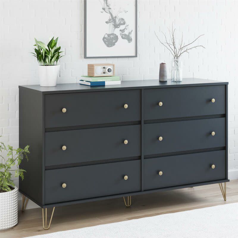 <p><a href="https://go.redirectingat.com?id=74968X1596630&url=https%3A%2F%2Fwww.wayfair.com%2F--%2Fpdp%2Fnovogratz--owen-6-drawer-double-dresser-5396com-l6132-w003073697.html&sref=https%3A%2F%2F" rel="nofollow noopener" target="_blank" data-ylk="slk:Shop Now;elm:context_link;itc:0;sec:content-canvas" class="link rapid-noclick-resp">Shop Now</a></p><p>Owen 6 Drawer Double Dresser</p><p>wayfair.com</p><p>$286.96</p><span class="copyright">Wayfair</span>