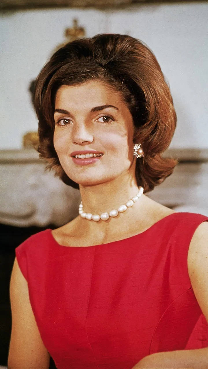 Jackie Kennedy red dress smiling