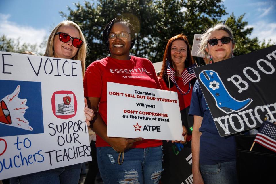 Jerrica Liggins, second from left, gathers with fellow teachers from Paris ISD at the Texas Capitol on Oct. 7, 2023. Liggins and her colleagues traveled to Austin to protest against school vouchers. Hundreds gathered to protest two days before a special session was slated to begin on Oct. 9, 2023.