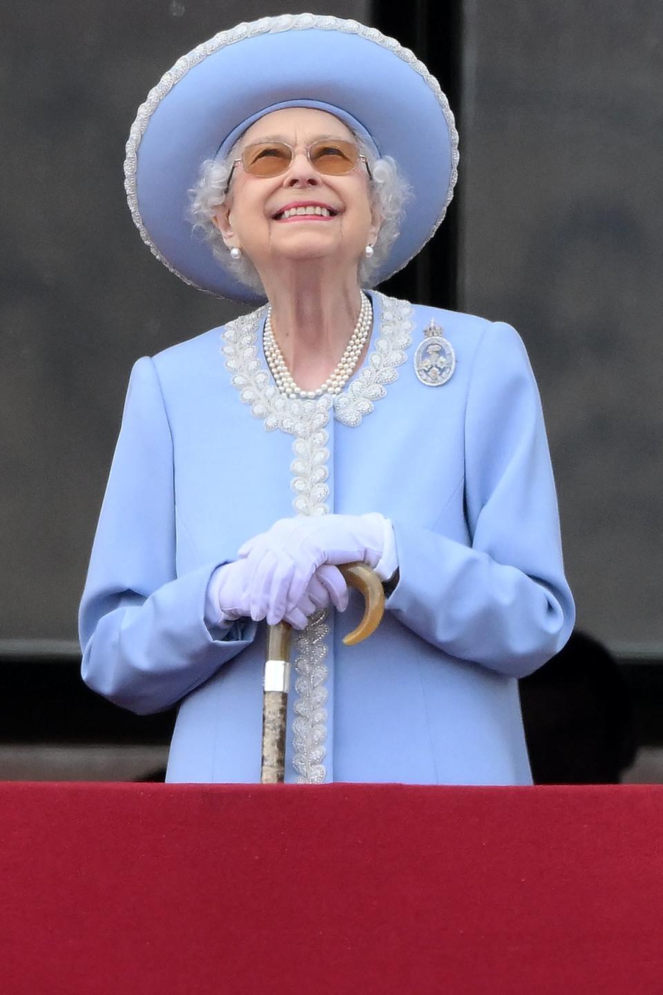 The monarch wore an Angela Kelly design (AFP via Getty Images)