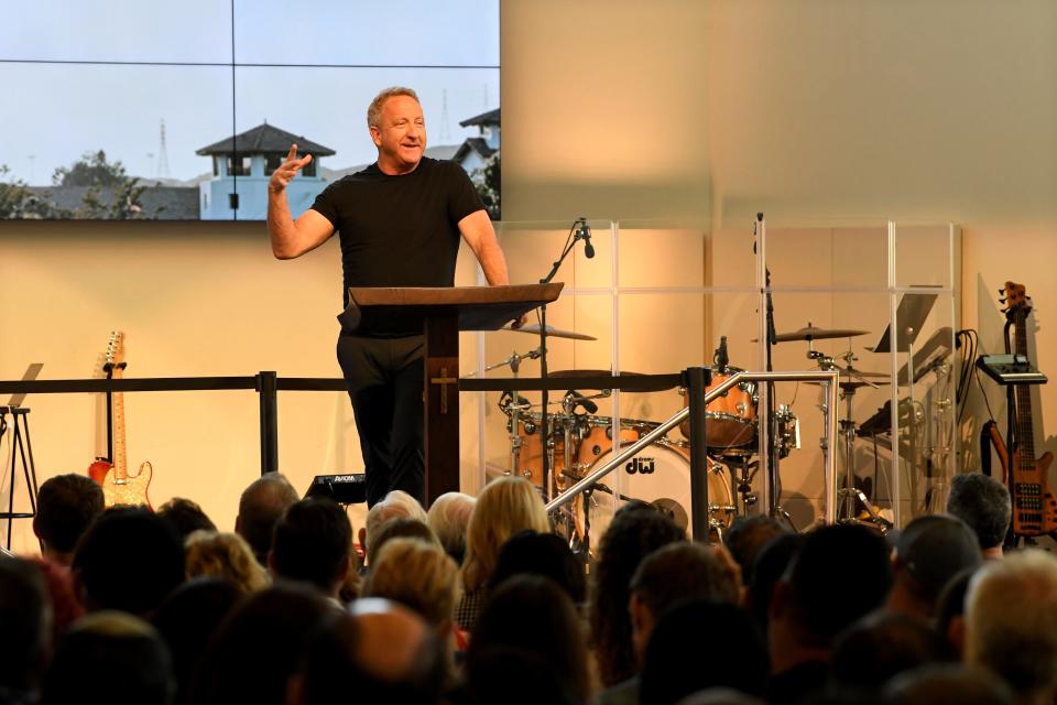 Pastor Rob McCoy of Godspeak Calvary Chapel in Newbury Park speaks from the pulpit of his church Aug. 21. McCoy travels across the nation, urging people of faith to fight back against what he calls government tyranny.