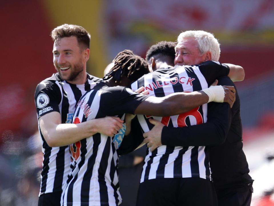 Newcastle celebrate drawing at Liverpool (Pool via REUTERS)