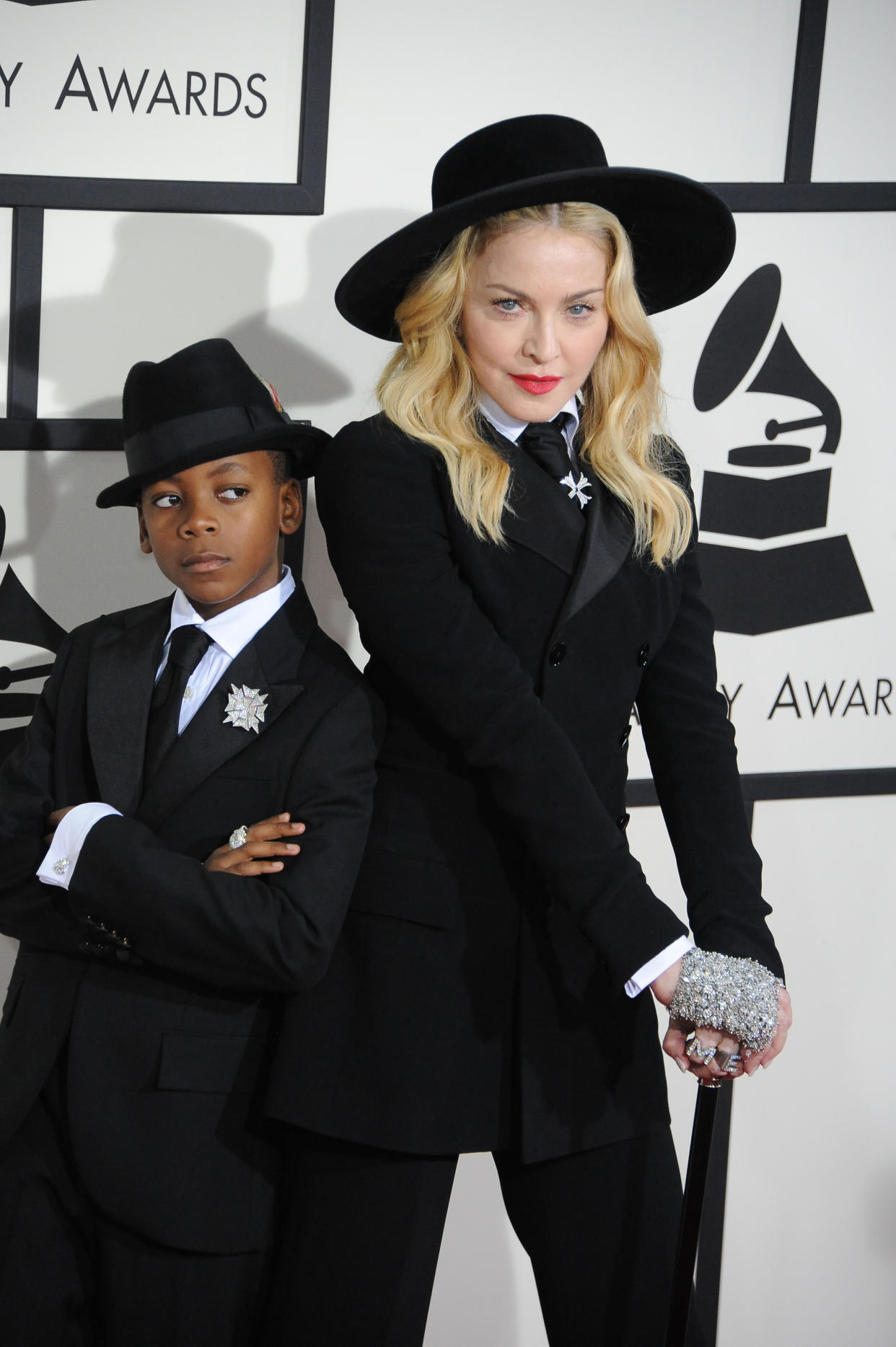 Singer Madonna and David Banda arrive at the 56th GRAMMY Awards held at the Staples Center. (Photo by Frank Trapper/Corbis via Getty Images)