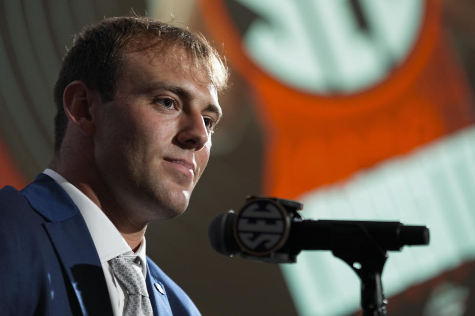 FILE - Georgia tight end Brock Bowers responds to questions during NCAA college football Southeastern Conference Media Days, Tuesday, July 18, 2023, in Nashville, Tenn. Bowers is widely considered one of the top 10 players in next week's NFL draft but because he plays a lower-premium position of tight end, there is much more uncertainty about how high he will get drafted.(AP Photo/George Walker IV, File)