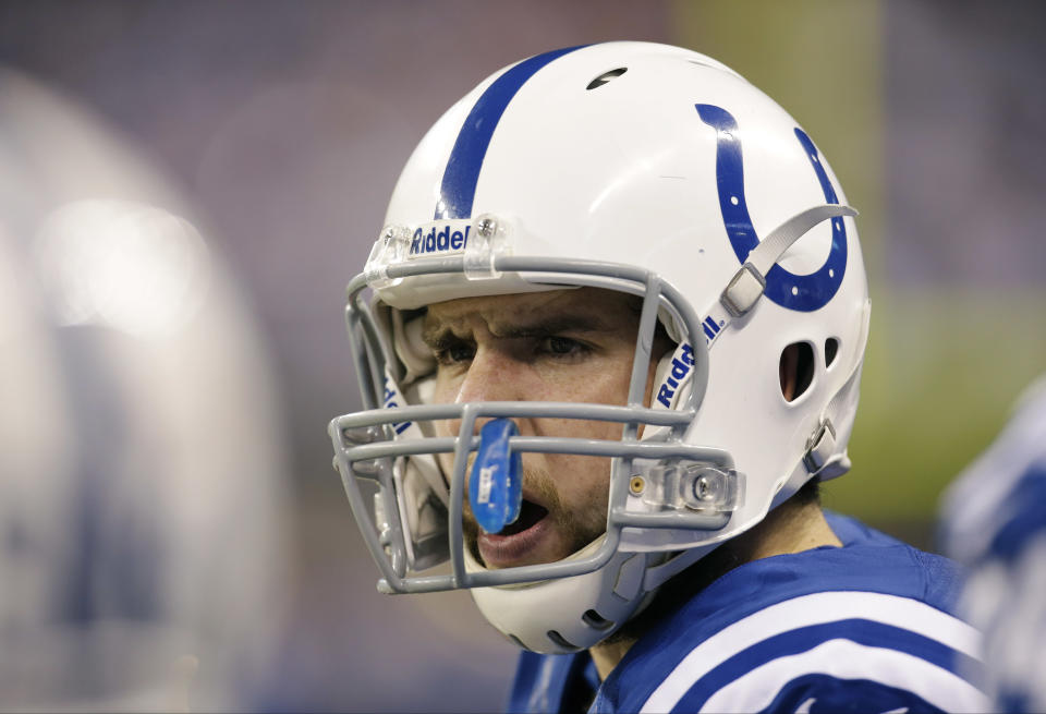 Indianapolis Colts quarterback Andrew Luck talks to his teammates during the first half of an NFL wild-card playoff football game against the Kansas City Chiefs Saturday, Jan. 4, 2014, in Indianapolis. (AP Photo/AJ Mast)
