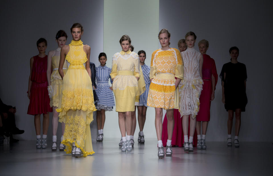 Models wear designs created by Bora Aksu during London Fashion Week Spring/Summer 2014, at Somerset House in central London, Friday, Sept. 13, 2013. (Photo by Joel Ryan/Invision/AP)