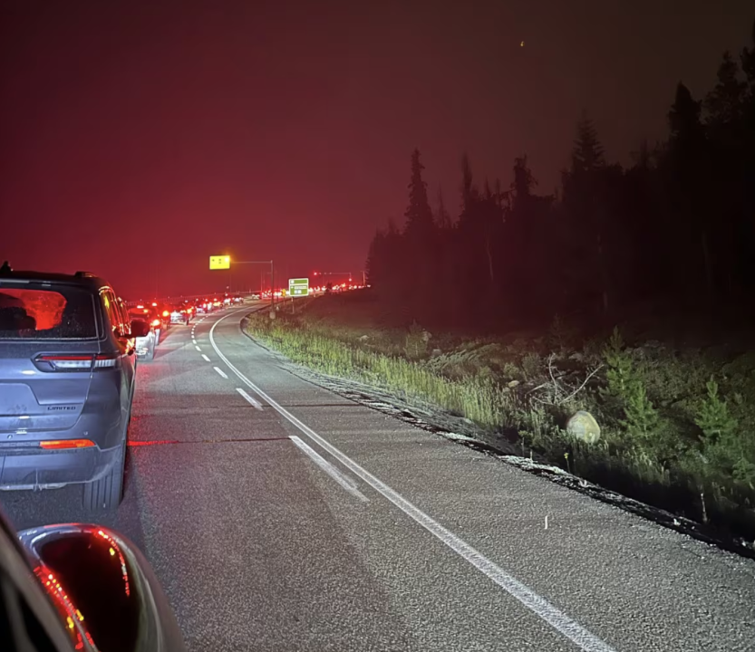 Evacuees from Jasper, Alta., clog the highway early Tuesday morning. (The Canadian Press/HO-X/@_CLCampbell)