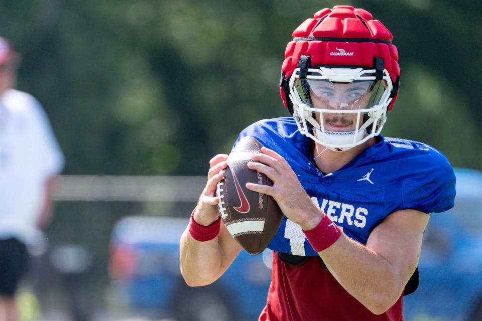 Jackson Arnold (11) runs drills during an Oklahoma football practice in Norman, Okla., on Tuesday, Aug. 13, 2024.