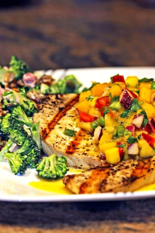 <p>Kevin is Cooking</p><p>Mango salsa on grilled swordfish is a simple and healthy way to spice up that grilled fish with a great side dish packed full of flavors and vegetables. It is a quick and easy salsa to make and compliments the grilled swordfish perfectly.</p><p><strong>Get the recipe: <a href="https://keviniscooking.com/mango-salsa-grilled-swordfish/" rel="nofollow noopener" target="_blank" data-ylk="slk:Mango Salsa Grilled Swordfish;elm:context_link;itc:0;sec:content-canvas" class="link rapid-noclick-resp">Mango Salsa Grilled Swordfish</a></strong></p>