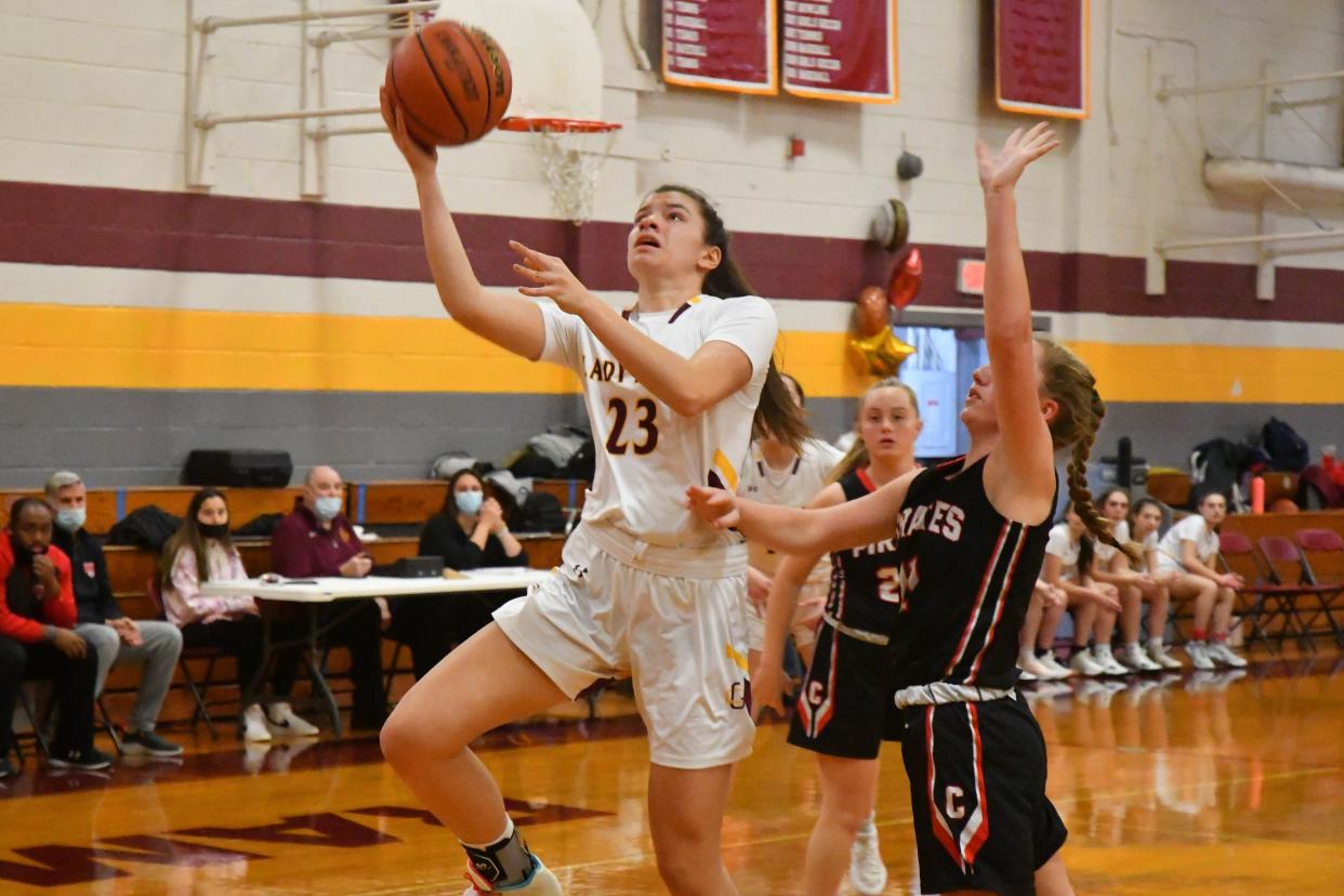 Gloucester Catholic junior Macie Nugent goes up for a layup against Cinnaminson guard Ava Sztenderowicz