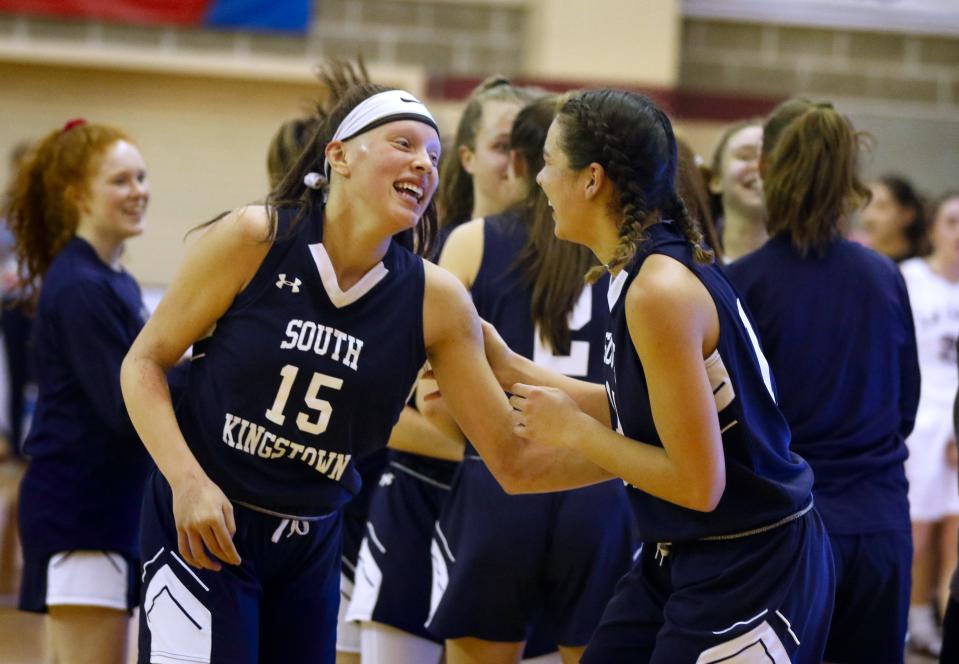 Jami Hill, left, and the South Kingstown girls basketball team won the Division I title last year. Can they repeat?