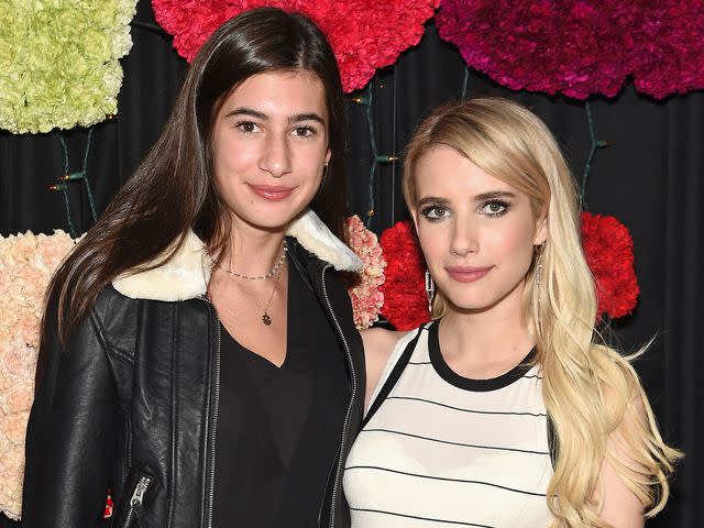<p>Jamie McCarthy/Getty</p> Grace Nickels and Emma Roberts as Teen Vogue and Aerie celebrate Emma Roberts' November Cover on October 24, 2015 in New York City.