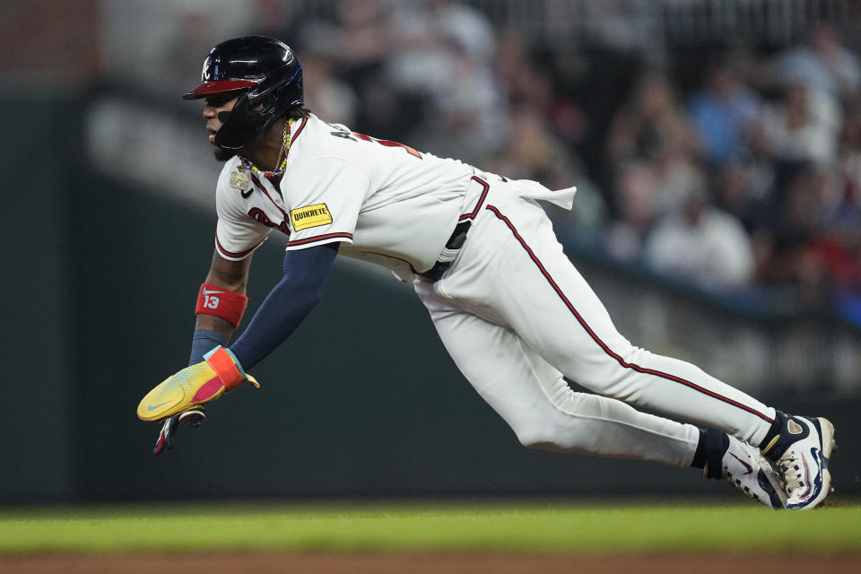 Atlanta Braves' Ronald Acuna Jr. steals second base in the fifth inning of a baseball game against the Philadelphia Phillies Tuesday, Sept. 19, 2023. (AP Photo/John Bazemore)