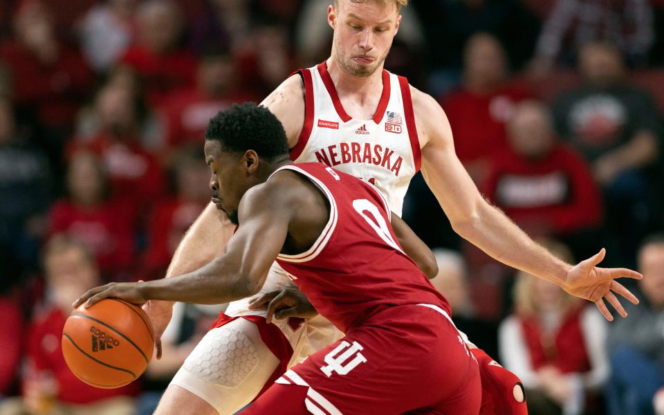 Nebraska's Rienk Mast, top, defends against Indiana's Xavier Johnson during the first half of an NCAA college basketball game Wednesday, Jan. 3, 2024, in Lincoln, Neb. (AP Photo/Rebecca S. Gratz)