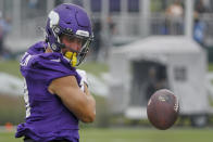 Minnesota Vikings wide receiver Adam Thielen celebrates his catch during NFL football training camp Friday, July 30, 2021, in Eagan, Minn. (AP Photo/Bruce Kluckhohn)