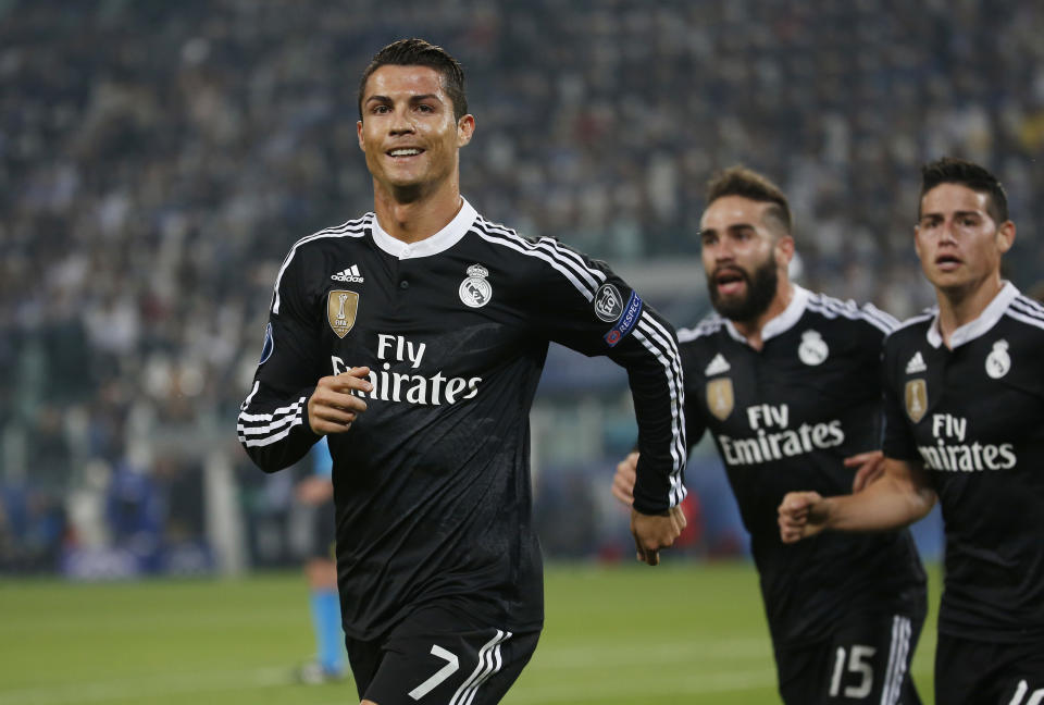 Real Madrid's Cristiano Ronaldo celebrates with team mates after scoring their first goal Reuters / Sergio Perez