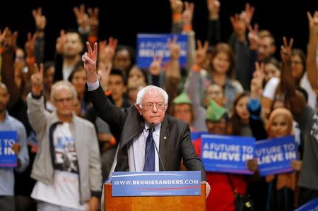 Democratic U.S. presidential candidate Bernie Sanders gestures as he speaks about the terror attack in Brussels during a campaign rally in San Diego, California March 22, 2016. REUTERS/Mike Blake