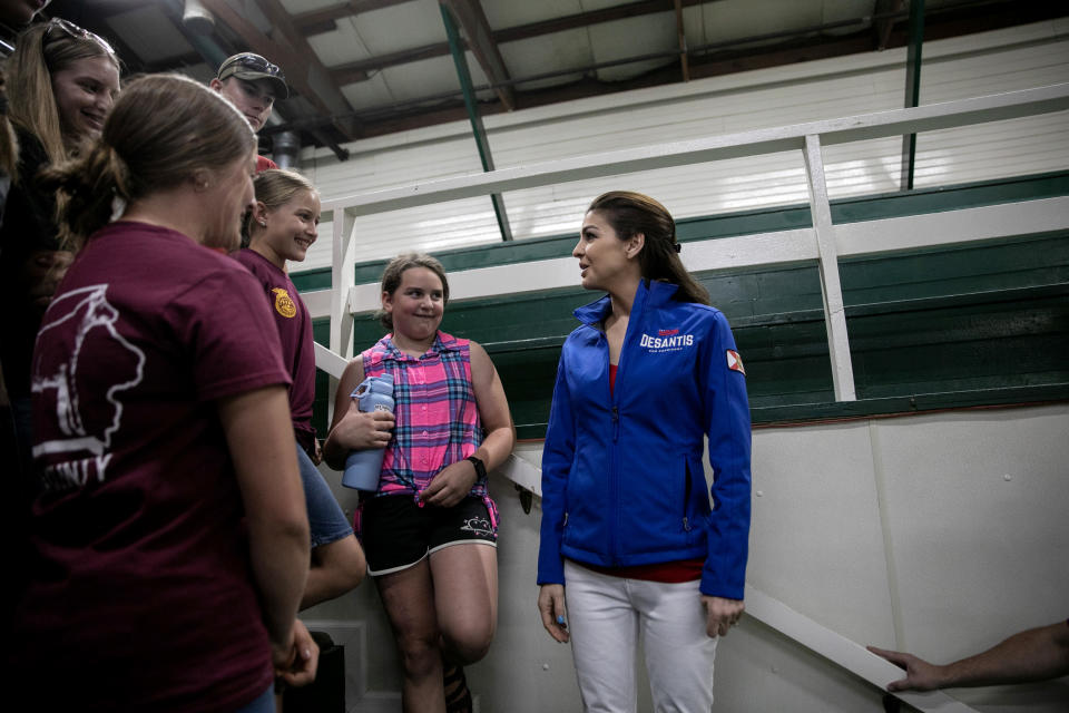 Image: Casey DeSantis talks with supporters at a campaign stop in Tama, Iowa, on Saturday. (Maddie McGarvey for NBC News)