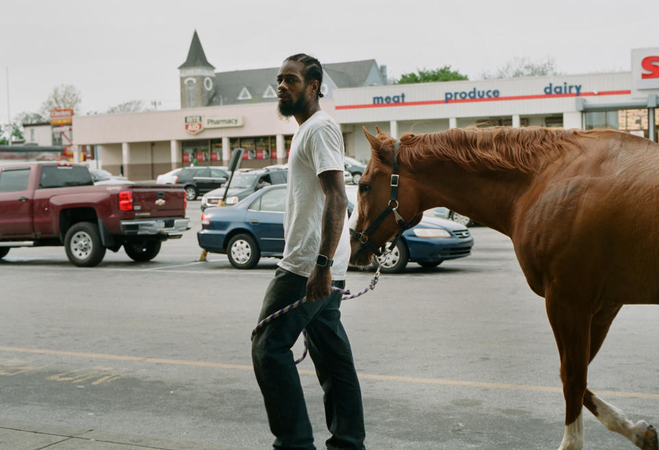 Jamil Prattis, who has maintained horses for 15 years, on Fletcher Street in 2017.<span class="copyright">Sam Nixon</span>