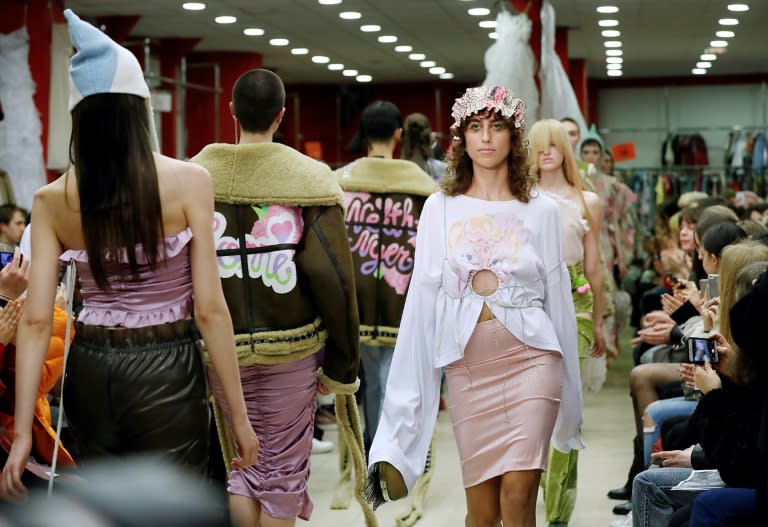 Models present creations by Neith Nyer during the women's Fall-Winter 2017-2018 ready-to-wear collection fashion show in Paris, on March 1, 2017