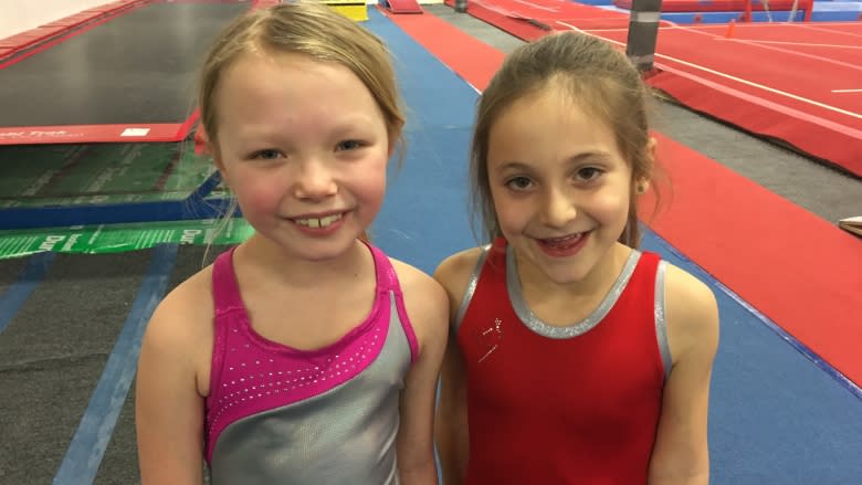 Young gymnasts jump for joy at a chance to see Olympian Nadia Comaneci in Windsor