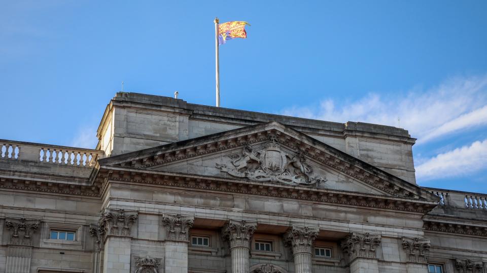 The royal standard flying above Buckingham Palace