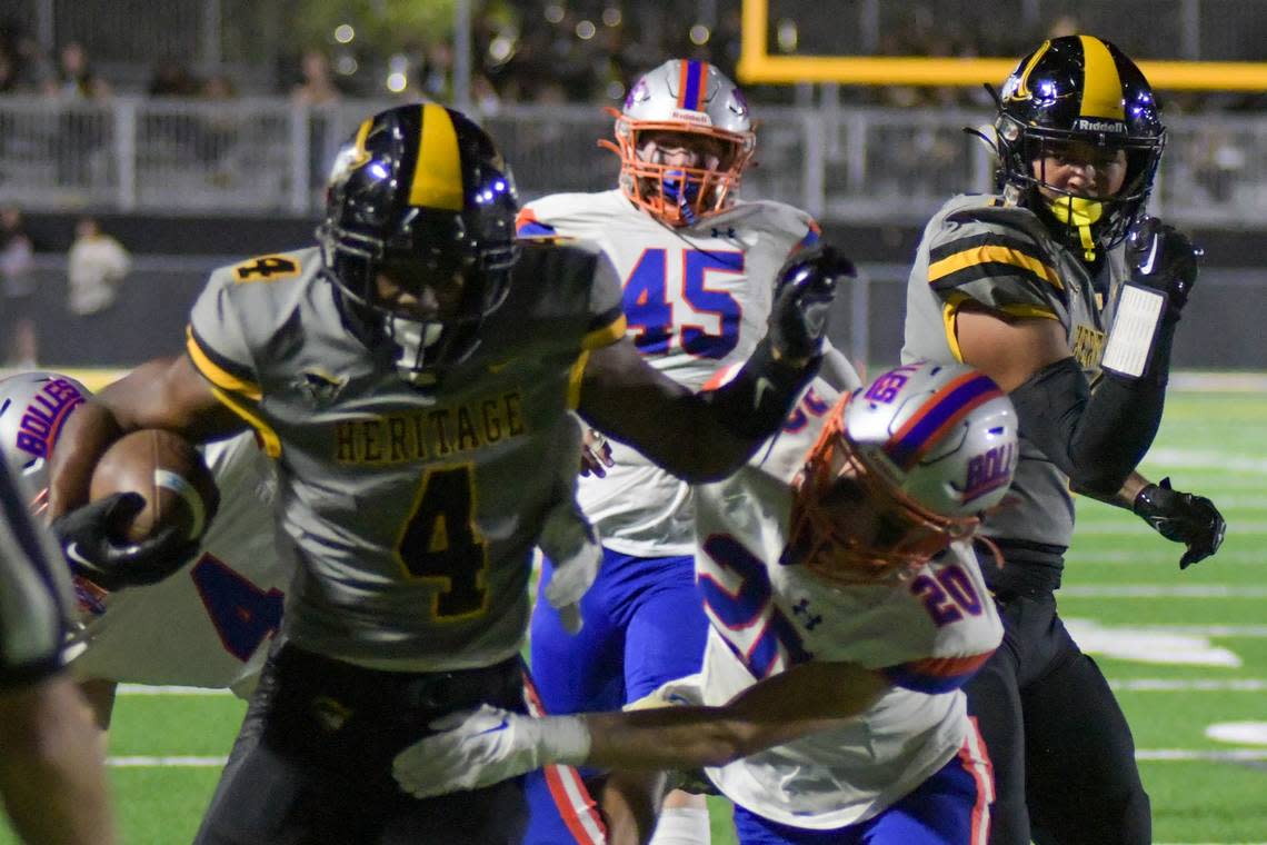 American Heritage running back Mark Fletcher carries the ball in a Class 2M state semifinal game against Jacksonville Bolles on Friday, Dec. 2, 2022, at American Heritage School in Plantation, Florida.