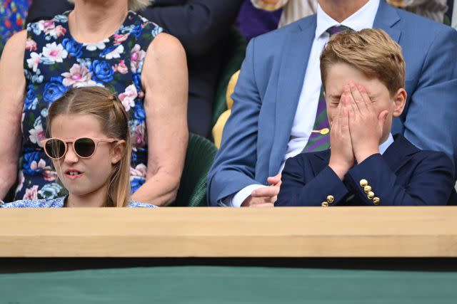 <p>Karwai Tang/WireImage</p> Princess Charlotte and Prince George watch Wimbledon on July 16 in the Royal Box.