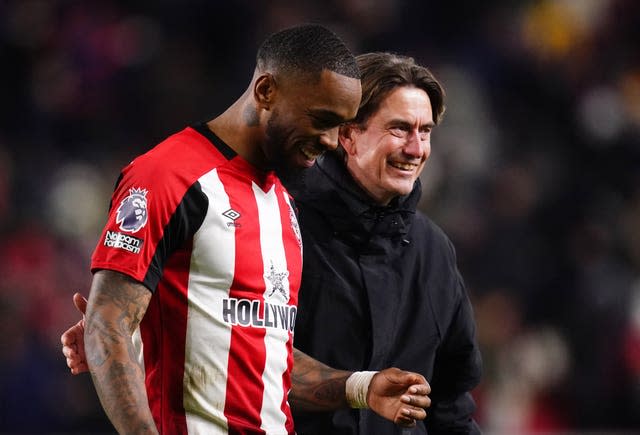 Brentford’s Ivan Toney (left) and manager Thomas Frank