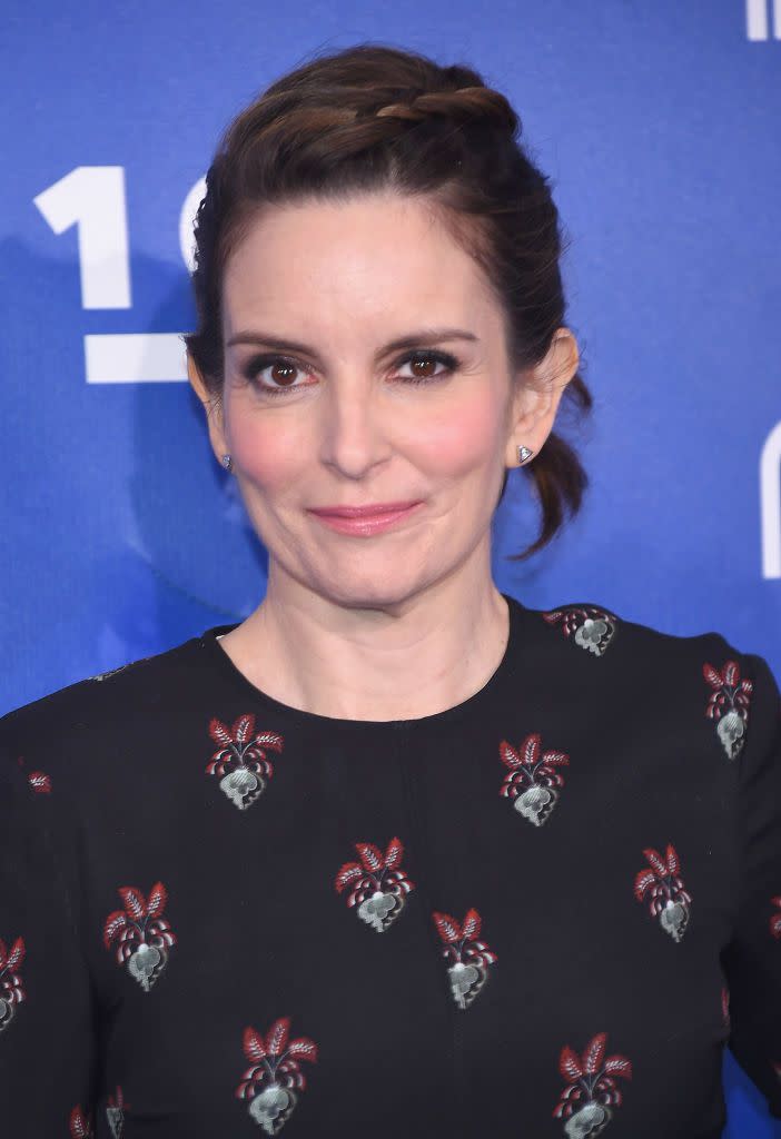 <p>Braids are once again the simplest way to add some interest to a short style. We love Fey's asymmetrical rendition, which gives some punky detail to an otherwise simple outfit. </p>