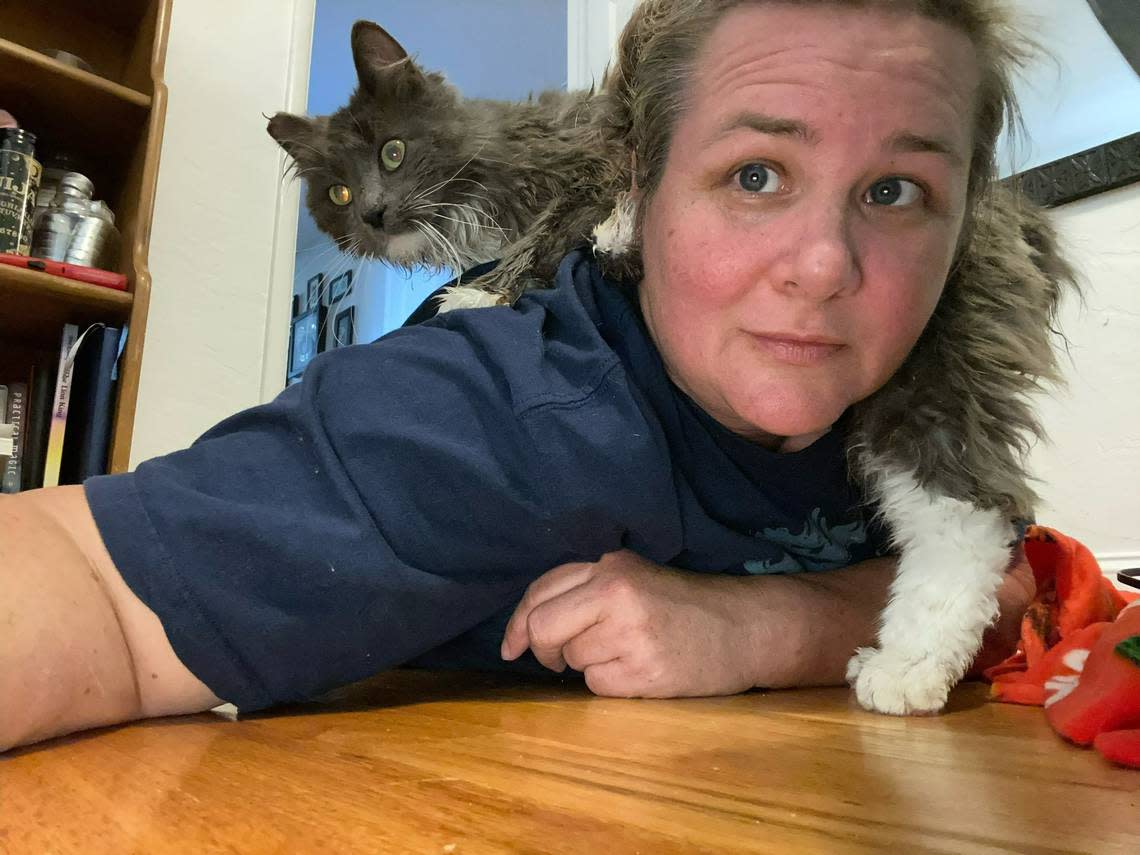 Fresno T.N.R. co-founder Brandi Sherman and one of her stray feline rescues pose for a selfie. Unfortunately, “Greyson” died five days undergoing medical treatments. “I took that one hard,” Sherman said.