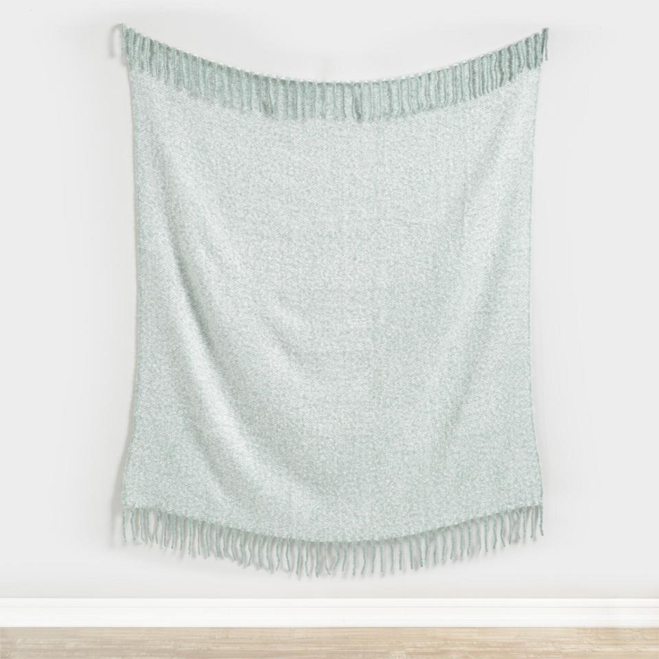 One of the small joys of adulthood is receiving cozy blankets. This <strong><a href="https://fave.co/32GNKZE" target="_blank" rel="noopener noreferrer">jade green throw</a></strong> is great for wrapping up in a chilly office, lounging on the couch or placing at the foot of a bed. <strong><a href="https://fave.co/32GNKZE" target="_blank" rel="noopener noreferrer">Get it at World Market</a></strong>.