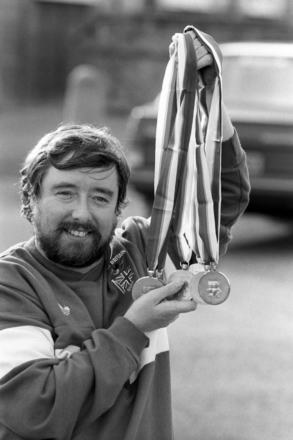 Manchester's Mike Kenny in Aylesbury today proudly showing his collection of swimming medals won in the Paralympics in Seoul. He won an astonishing five gold and one silver helping the British team to third place in the medals table.