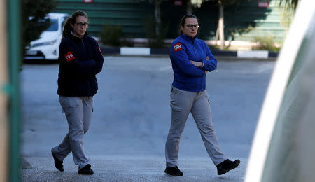 Members of the Temporary International Presence in Hebron (TIPH) walk at their headquarters in Hebron, in the Israeli-occupied West Bank January 29, 2019. REUTERS/Mussa Qawasma