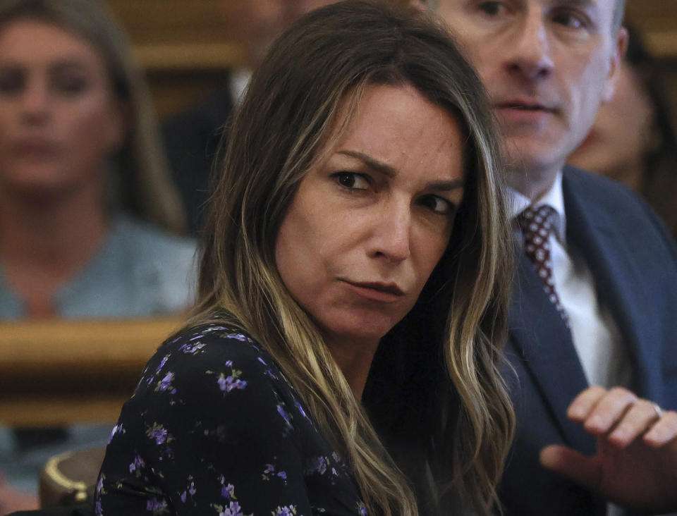 Karen Read listens during closing arguments in her trial at Norfolk Superior Court on Tuesday, June 25, 2024 in Dedham, Mass. Read is accused of killing her boyfriend Boston police Officer John O'Keefe, in 2022. (Nancy Lane/The Boston Herald via AP, Pool)