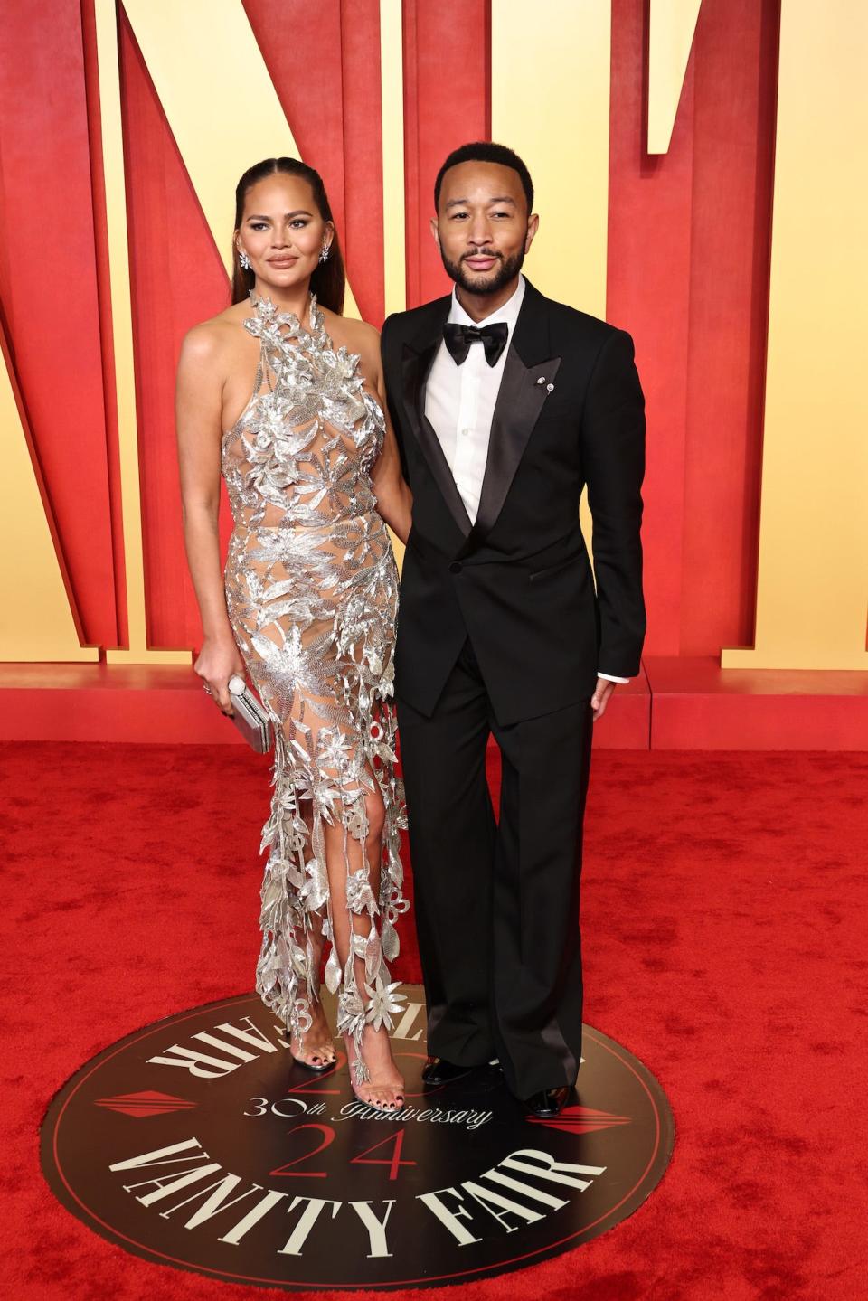 Chrissy Teigen and John Legend attend the 2024 Vanity Fair Oscars after-party.