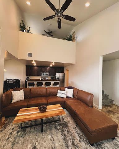 <p>Christine Brown/Instagram</p> The living, kitchen and dining area in Christine Brown and David Woolley's Airbnb.