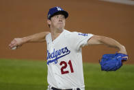 Los Angeles Dodgers starting pitcher Walker Buehler throws against the Atlanta Braves during the first inning in Game 1 of a baseball National League Championship Series Monday, Oct. 12, 2020, in Arlington, Texas. (AP Photo/Tony Gutierrez)