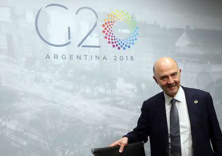 European Commissioner for Economic and Financial Affairs Pierre Moscovici arrives for a news conference at the G20 Meeting of Finance Ministers in Buenos Aires, Argentina, July 22, 2018. REUTERS/Marcos Brindicci