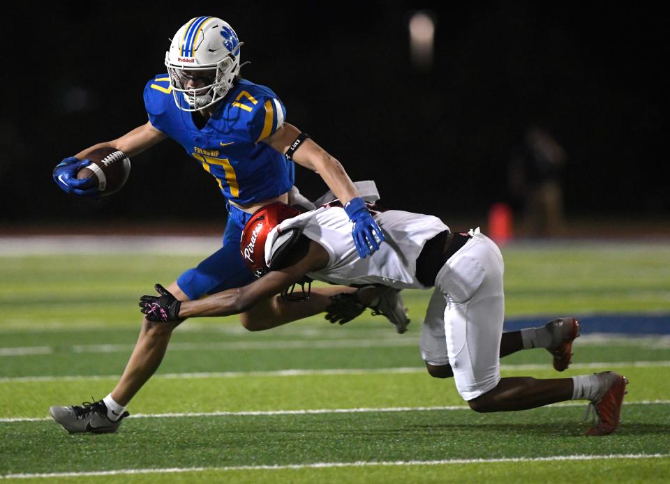 Frenship's Leyton Stone runs with the ball against Lubbock-Cooper in a non-district football game, Friday, Sept. 1, 2023, at Peoples Bank Stadium in Wolfforth.