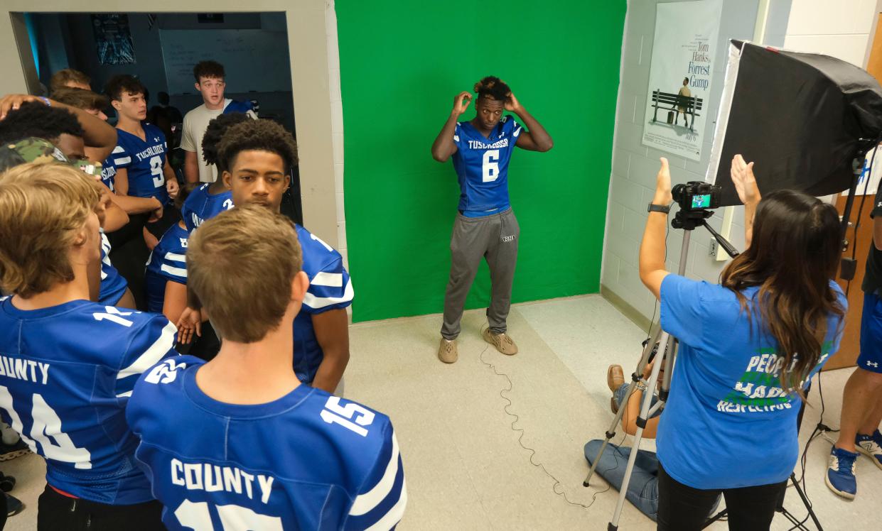 Tuscaloosa County High students shoot video content for the school’s new video board Friday, Aug. 18, 2023. TCHS player Kevin Riley stands ready for his introduction to be recorded.
(Credit: Gary Cosby Jr.-Tuscaloosa News)