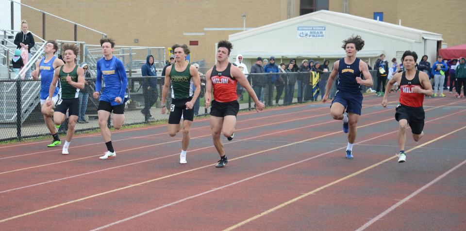 St. Mary Catholic Central’s Cole Jondro and Cole McElvany of Milan battle for the lead in the center of the field in the boys 100-meter finals at the Jefferson Invitational Saturday. Jondro won the event and McElvany was second.